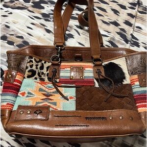 STS Ranchwear  purse with concealed Carry compartment.